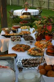 A variety of appetizers at this outdoor party.